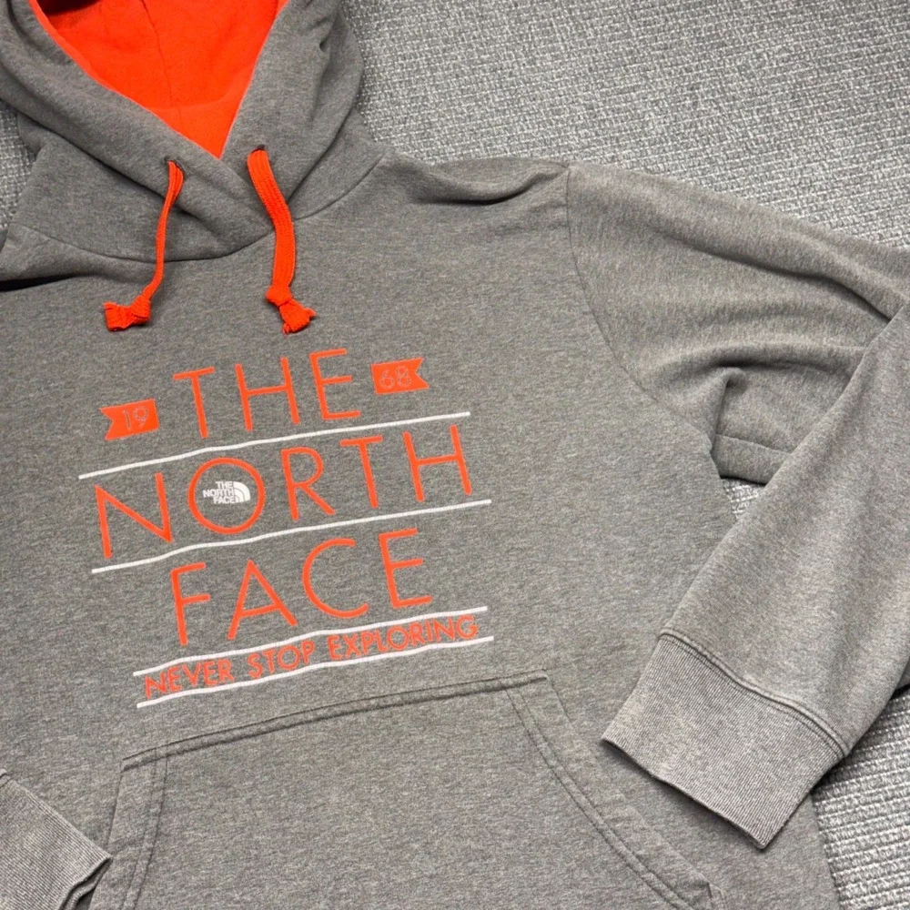 The North Face Mens Grey Orange Graphic Pullover Hoodie Never Stop Exploring Med
